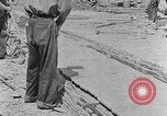 Image of hammering rock slabs Tennessee United States USA, 1940, second 15 stock footage video 65675050026