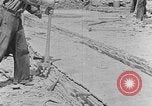 Image of hammering rock slabs Tennessee United States USA, 1940, second 18 stock footage video 65675050026