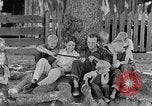 Image of man under a tree Kentucky United States USA, 1940, second 1 stock footage video 65675050028