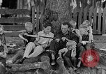 Image of man under a tree Kentucky United States USA, 1940, second 3 stock footage video 65675050028