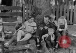 Image of man under a tree Kentucky United States USA, 1940, second 8 stock footage video 65675050028