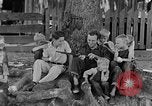 Image of man under a tree Kentucky United States USA, 1940, second 9 stock footage video 65675050028