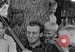 Image of man under a tree Kentucky United States USA, 1940, second 13 stock footage video 65675050028