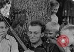 Image of man under a tree Kentucky United States USA, 1940, second 14 stock footage video 65675050028