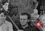 Image of man under a tree Kentucky United States USA, 1940, second 15 stock footage video 65675050028