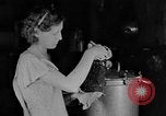 Image of women in kitchen Kentucky United States USA, 1940, second 20 stock footage video 65675050030