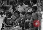 Standbild Afroamerikanische Kinder spielen Calhoun Alabama USA, 1940, aus Sekunde 40 historischem Filmmaterial Videoclip 65675050051