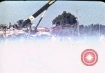 Image of bulldozers and cranes Beirut Lebanon, 1983, second 12 stock footage video 65675050075