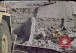 Image of bulldozers and cranes Beirut Lebanon, 1983, second 47 stock footage video 65675050075