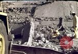 Image of bulldozers and cranes Beirut Lebanon, 1983, second 50 stock footage video 65675050075