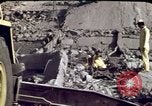 Image of bulldozers and cranes Beirut Lebanon, 1983, second 55 stock footage video 65675050075