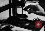Image of clock parts Detroit Michigan USA, 1920, second 34 stock footage video 65675050149