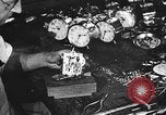 Image of assembling clocks Detroit Michigan USA, 1920, second 58 stock footage video 65675050150