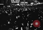Image of Crowds celebrate on election night in Times Square New York City USA, 1940, second 4 stock footage video 65675050195
