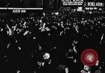 Image of Crowds celebrate on election night in Times Square New York City USA, 1940, second 16 stock footage video 65675050195