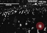 Image of Crowds celebrate on election night in Times Square New York City USA, 1940, second 19 stock footage video 65675050195
