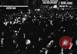 Image of Crowds celebrate on election night in Times Square New York City USA, 1940, second 21 stock footage video 65675050195
