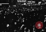 Image of Crowds celebrate on election night in Times Square New York City USA, 1940, second 25 stock footage video 65675050195