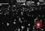 Image of Crowds celebrate on election night in Times Square New York City USA, 1940, second 26 stock footage video 65675050195