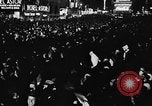 Image of Crowds celebrate on election night in Times Square New York City USA, 1940, second 29 stock footage video 65675050195