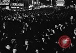 Image of Crowds celebrate on election night in Times Square New York City USA, 1940, second 32 stock footage video 65675050195