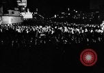 Image of Election returns showing in lights on Times Building New York City USA, 1940, second 3 stock footage video 65675050196