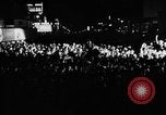 Image of Election returns showing in lights on Times Building New York City USA, 1940, second 4 stock footage video 65675050196