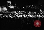 Image of Election returns showing in lights on Times Building New York City USA, 1940, second 5 stock footage video 65675050196