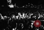 Image of Election returns showing in lights on Times Building New York City USA, 1940, second 10 stock footage video 65675050196