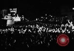 Image of Election returns showing in lights on Times Building New York City USA, 1940, second 12 stock footage video 65675050196