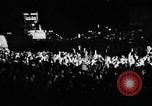 Image of Election returns showing in lights on Times Building New York City USA, 1940, second 15 stock footage video 65675050196