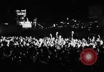 Image of Election returns showing in lights on Times Building New York City USA, 1940, second 16 stock footage video 65675050196