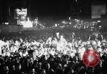 Image of Election returns showing in lights on Times Building New York City USA, 1940, second 17 stock footage video 65675050196