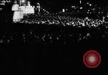 Image of Election returns showing in lights on Times Building New York City USA, 1940, second 19 stock footage video 65675050196