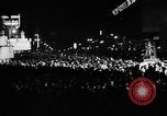 Image of Election returns showing in lights on Times Building New York City USA, 1940, second 25 stock footage video 65675050196