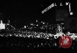Image of Election returns showing in lights on Times Building New York City USA, 1940, second 26 stock footage video 65675050196