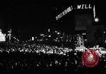 Image of Election returns showing in lights on Times Building New York City USA, 1940, second 27 stock footage video 65675050196