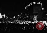 Image of Election returns showing in lights on Times Building New York City USA, 1940, second 29 stock footage video 65675050196