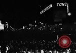 Image of Election returns showing in lights on Times Building New York City USA, 1940, second 42 stock footage video 65675050196
