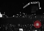 Image of Election returns showing in lights on Times Building New York City USA, 1940, second 43 stock footage video 65675050196