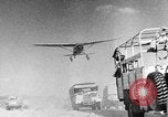 Image of British soldiers retrieve a disabled tank while being shelled North Africa, 1941, second 3 stock footage video 65675050209