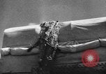 Image of British soldiers retrieve a disabled tank while being shelled North Africa, 1941, second 16 stock footage video 65675050209