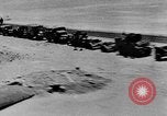 Image of British soldiers retrieve a disabled tank while being shelled North Africa, 1941, second 22 stock footage video 65675050209