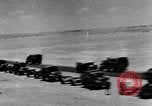 Image of British soldiers retrieve a disabled tank while being shelled North Africa, 1941, second 23 stock footage video 65675050209