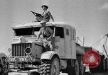 Image of British soldiers retrieve a disabled tank while being shelled North Africa, 1941, second 32 stock footage video 65675050209