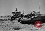 Image of British soldiers retrieve a disabled tank while being shelled North Africa, 1941, second 41 stock footage video 65675050209