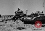 Image of British soldiers retrieve a disabled tank while being shelled North Africa, 1941, second 42 stock footage video 65675050209