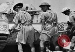 Image of British soldiers retrieve a disabled tank while being shelled North Africa, 1941, second 43 stock footage video 65675050209