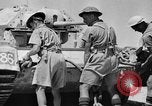 Image of British soldiers retrieve a disabled tank while being shelled North Africa, 1941, second 44 stock footage video 65675050209