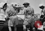 Image of British soldiers retrieve a disabled tank while being shelled North Africa, 1941, second 45 stock footage video 65675050209